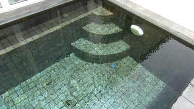 Swimming pool on the terrace of the VILLA PARIS natural stones slate tiles